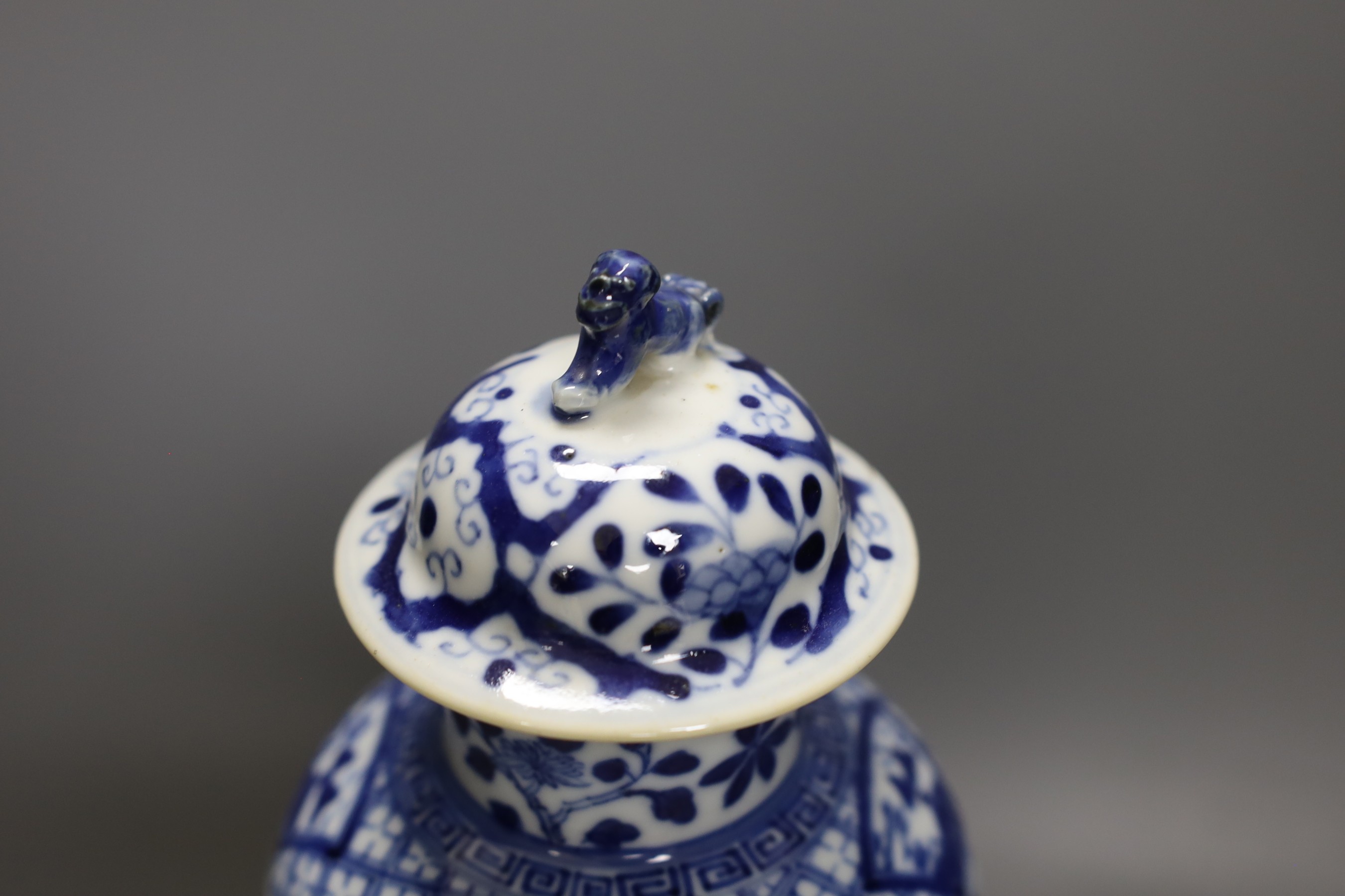 A 19th century Chinese blue and white 'boys and jar' vase and cover 28cm